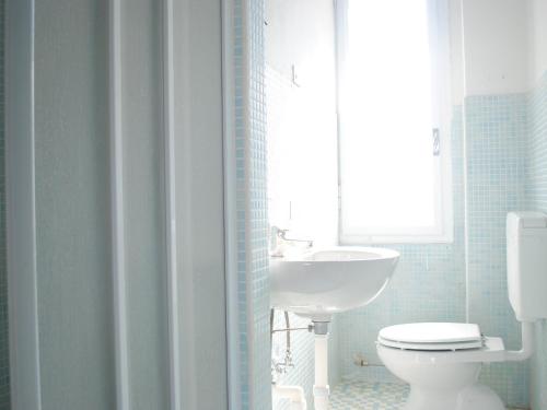 Ένα μπάνιο στο Dreaming Verona Rooms