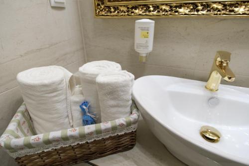 Koupelna v ubytování Integra Hotel