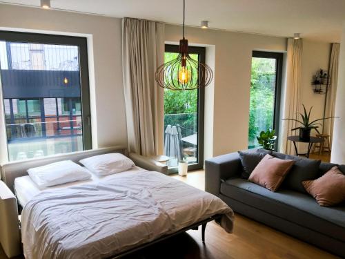 Postel nebo postele na pokoji v ubytování Modern Appartment in the Heart of Ghent