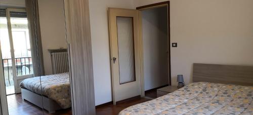 En eller flere senge i et værelse på Casa della Sala Spada