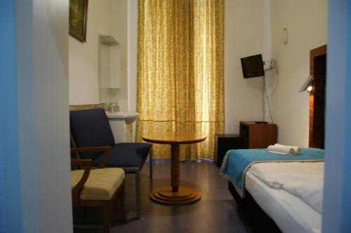 Postel nebo postele na pokoji v ubytování Hotel Garni Aaberna
