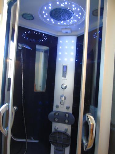 a bathroom with a shower with a toilet in it at CASA VAN DE WALLE in Tijarafe