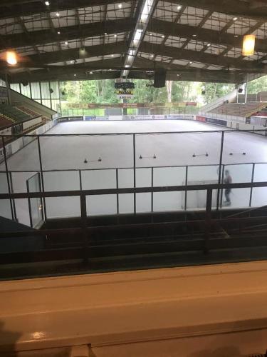 a view of a skating rink in a building at "Altes Haus" am Kurpark in den Bergen in Zorge