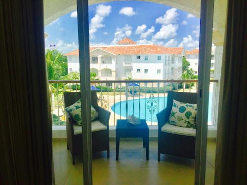 Piscina en o cerca de Sunny Day @CadaquesCaribe Bayahibe Dominicus