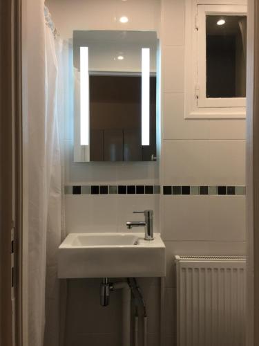 Ванная комната в Joli 2 pièces # Paris 14eme