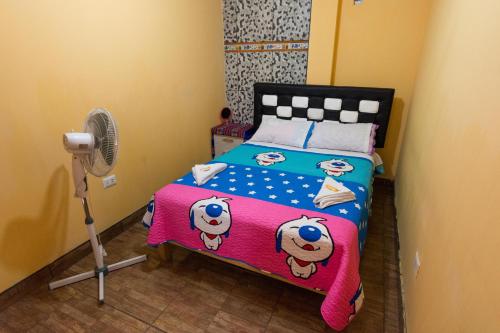 Un ou plusieurs lits dans un hébergement de l'établissement Hospedaje el viajero-Aeropuerto