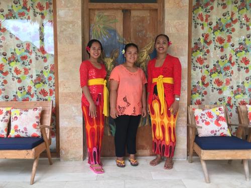 a group of three women standing in a room at Sun Suko Boutique Resort in Pemuteran