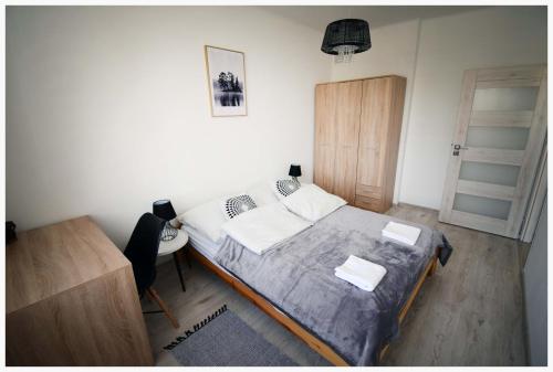 Llit o llits en una habitació de Color 24 Apartament II