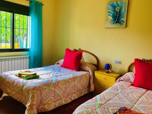 Säng eller sängar i ett rum på Casa Rural Los Acebos