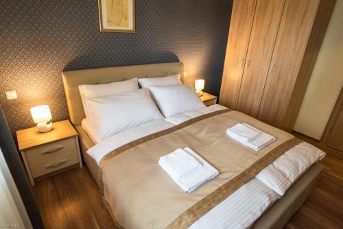 Кровать или кровати в номере Hotel & Distillery Monogram