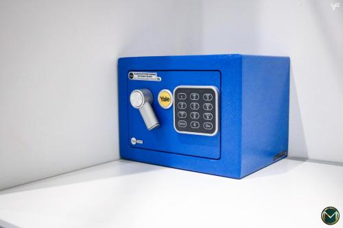 a blue box with a remote control in it at MARGHERITA BOUTIQUE ROOMS in Margherita di Savoia