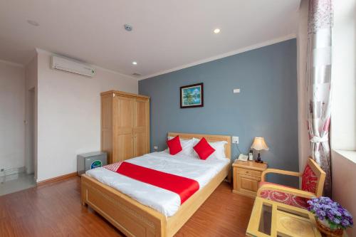 Giường trong phòng chung tại Capital O 417 Truong Son hotel