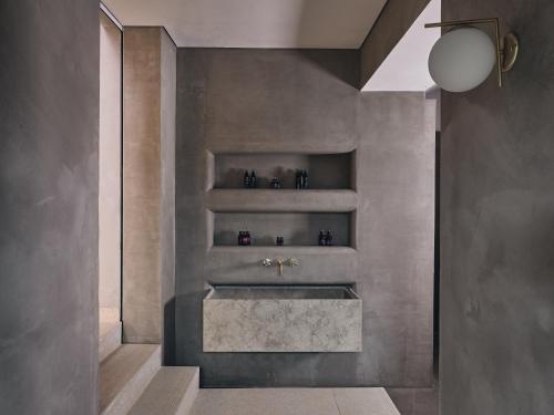 a bathroom with a sink and a shower at Contessina Suites & Spa - Adults Only in Tsilivi