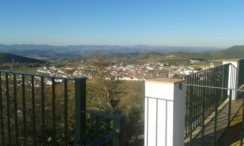 a view of a city from the balcony of a house at Casa Rural El Mirador in Guadalcanal