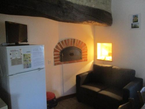 Una cocina o zona de cocina en Le gîte de la Petite Résie
