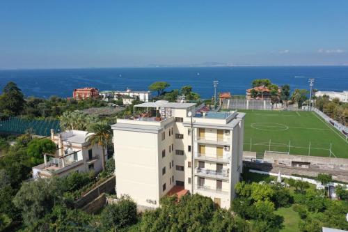 an aerial view of a building with a soccer field at Sea&Skyview in Sorrento