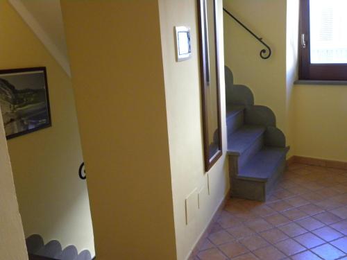 a hallway with a staircase in a house at Case Vacanze Albamarina in Lipari