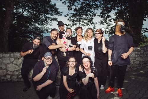 a group of people posing for a picture at Boutiquehotel Blaue Burg Falkenstein in Pfronten