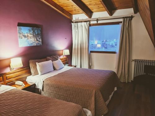 Katil atau katil-katil dalam bilik di Hotel Ushuaia