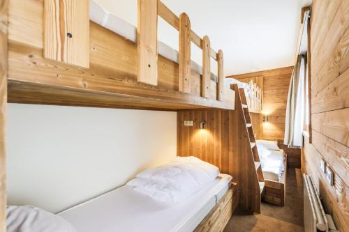 Postel nebo postele na pokoji v ubytování Residence Les Chalets du Forum - maeva Home