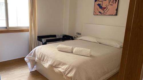 Katil atau katil-katil dalam bilik di Apartamentos Alocea