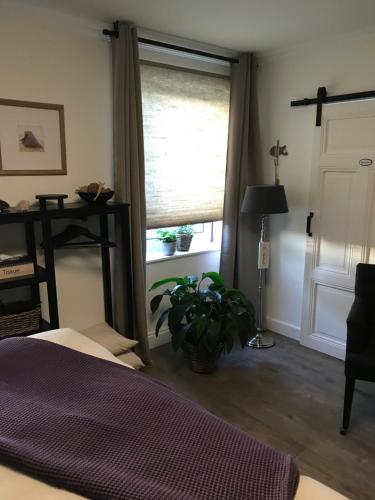 Postel nebo postele na pokoji v ubytování B&B Holset70