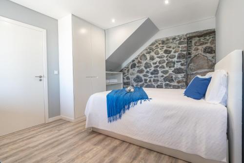 Postel nebo postele na pokoji v ubytování Casa Mariana by Rent2U, Lda