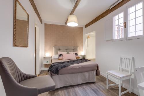 Кровать или кровати в номере Domus De Fiori