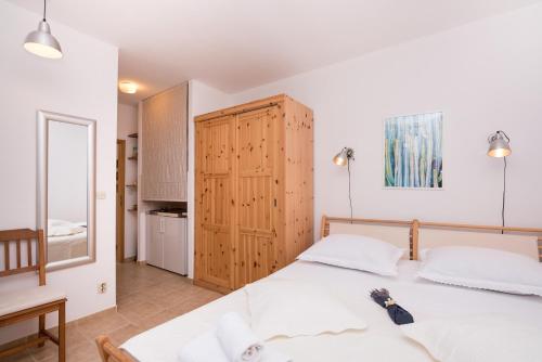Postel nebo postele na pokoji v ubytování Villa Katja