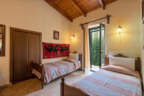 Una cama o camas en una habitación de Villa Aleva