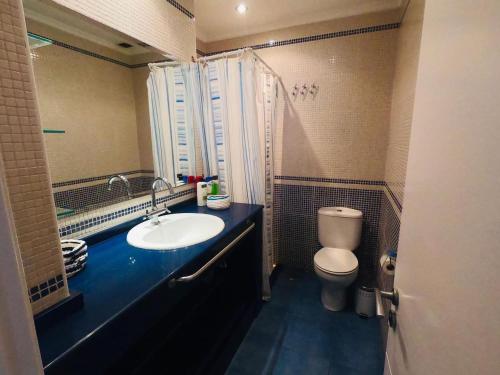 Koupelna v ubytování Ático con vistas al mar