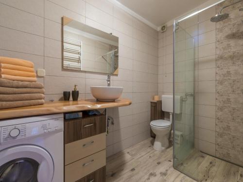 Koupelna v ubytování Apartments NINAC