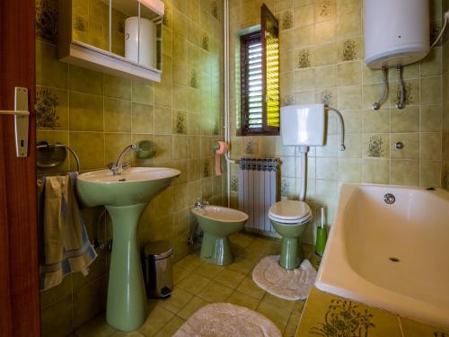 Kúpeľňa v ubytovaní Apartment DARINKA 1