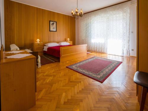 Posteľ alebo postele v izbe v ubytovaní Apartment DARINKA 1