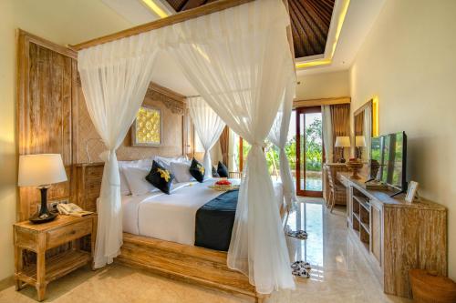 Кровать или кровати в номере Bliss Ubud Luxury Villa