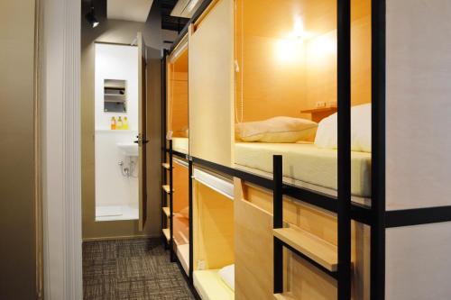 Postel nebo postele na pokoji v ubytování Guest House Tokyo Azabu