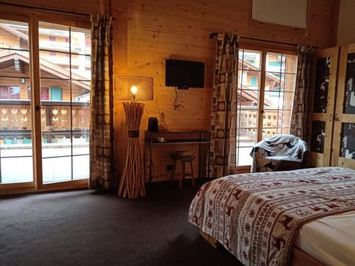 Postel nebo postele na pokoji v ubytování Hotel L'Etable