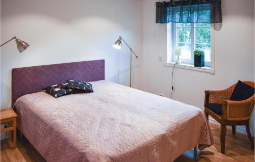 Ένα ή περισσότερα κρεβάτια σε δωμάτιο στο 3 Bedroom Lovely Home In Unnaryd