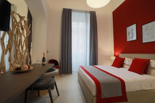 Кровать или кровати в номере Bespoke Roma Suites