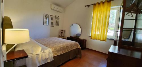 Postel nebo postele na pokoji v ubytování Agriturismo Fattoria Terranova