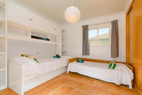 Posteľ alebo postele v izbe v ubytovaní Casa MARCOS Alcudia by Mallorca Villa Selection