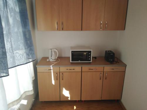 Η κουζίνα ή μικρή κουζίνα στο Apartament S&F