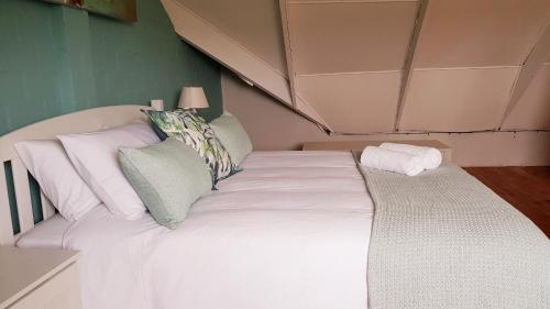 Katil atau katil-katil dalam bilik di West Coast Seaside Getaway
