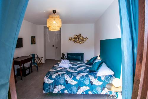 Ένα ή περισσότερα κρεβάτια σε δωμάτιο στο Bed and Breakfast MADERA