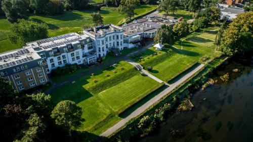 an aerial view of a large building on a lawn at Hotel Minella & Leisure Centre in Clonmel