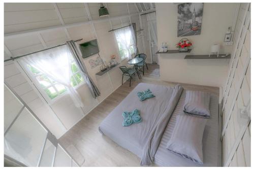 an overhead view of a room with two beds at Chill chill farm resort in Phetchabun