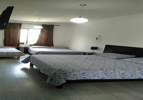Ліжко або ліжка в номері Hotel Vithez