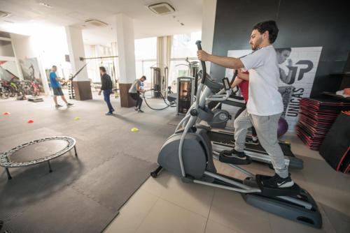a man on a treadmill in a gym at Salto Hotel y Casino in Salto