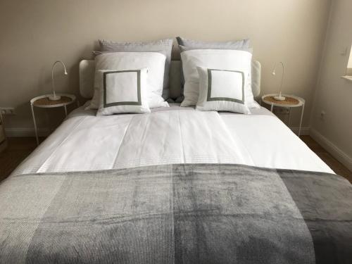 Säng eller sängar i ett rum på Ferienwohnung City-Apartment Swifts Krefeld