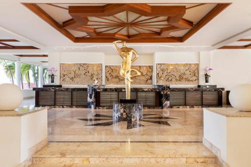 
De lobby of receptie bij Paradisus Palma Real Golf & Spa Resort All Inclusive

